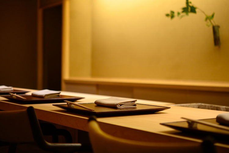 Quiet Japanese dining counter prepared for service.